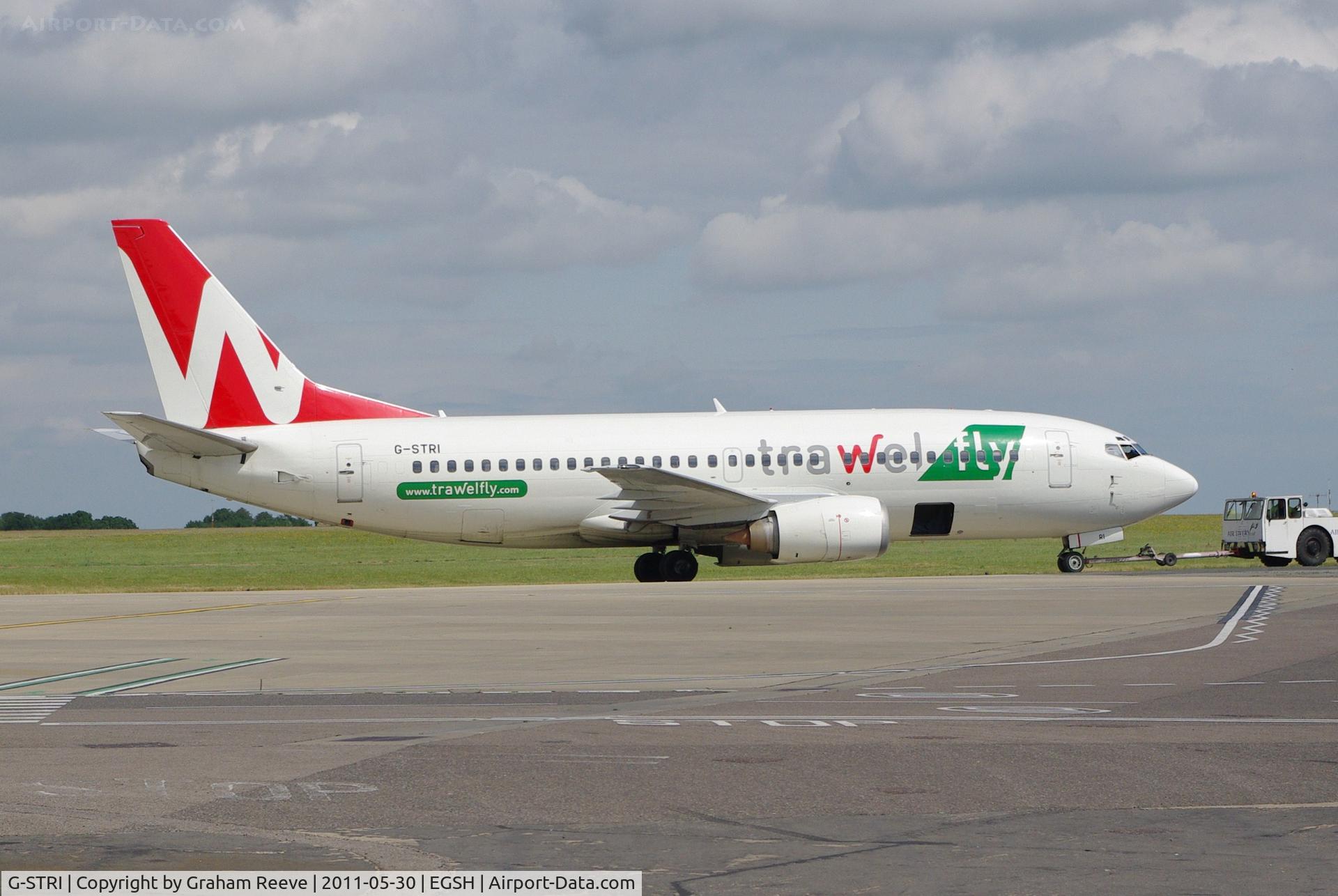 G-STRI, 1991 Boeing 737-33A C/N 25011, Under tow.