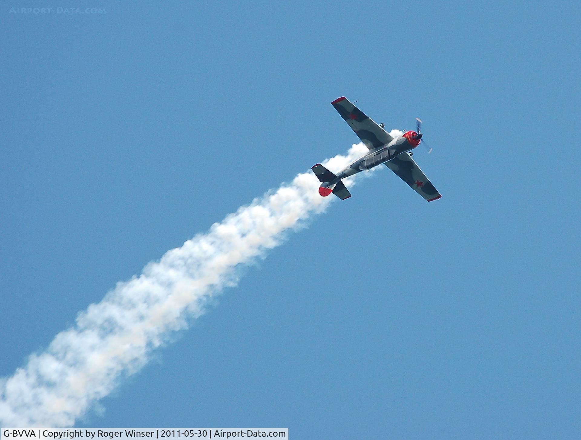 G-BVVA, 1987 Bacau Yak-52 C/N 877610, Off airport. Solo display by 'Osprey 2' over Swansea Bay during Mumbles Navy Days, Swansea Bay, Wales, UK