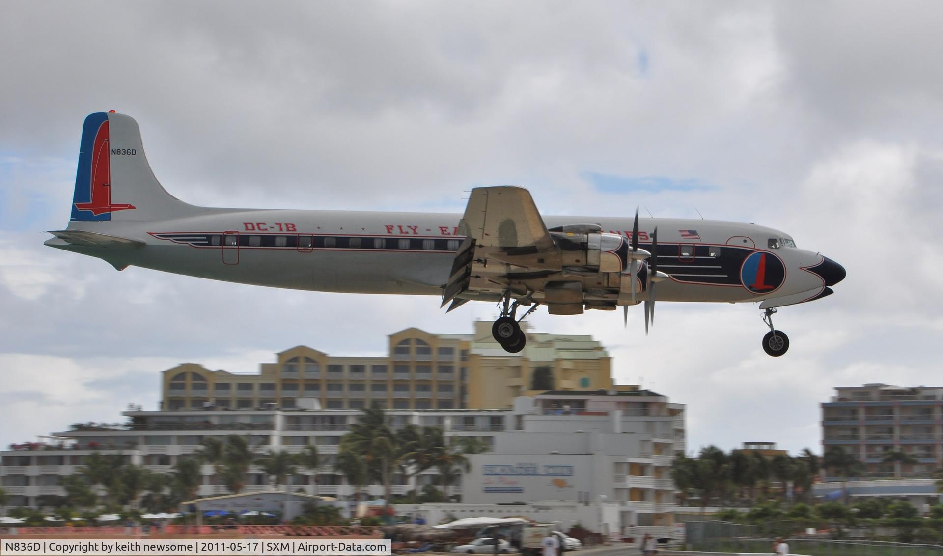 N836D, 1957 Douglas DC-7B C/N 45345, Landing back on St Maarten after a take off and landing for the photographers who flew in on board and had little chance to photograph these shots !