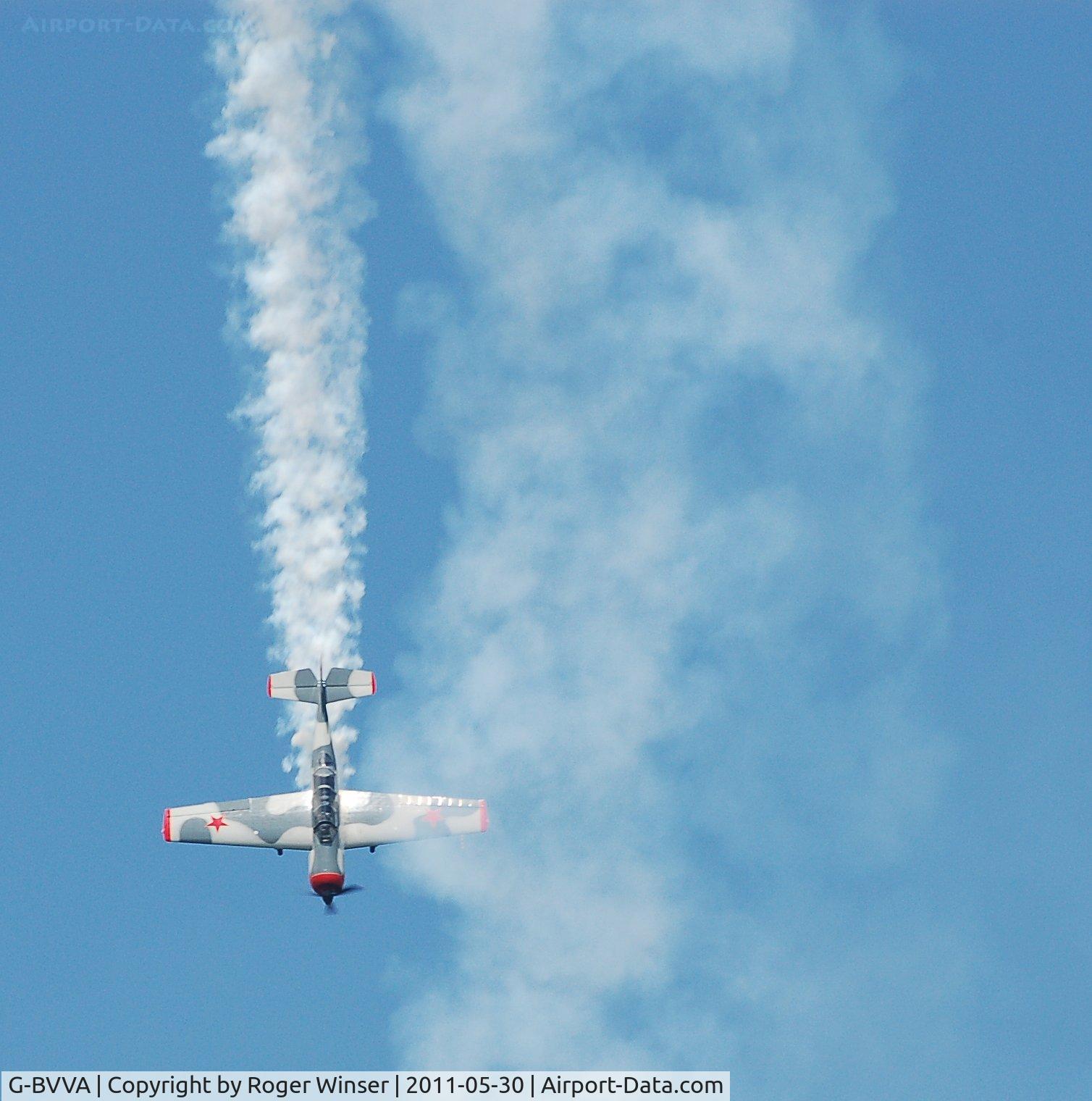 G-BVVA, 1987 Bacau Yak-52 C/N 877610, Off airport. Team Osprey solo display by Osprey 2 at Mumbles Navy Days, Swansea Bay, Wales, UK