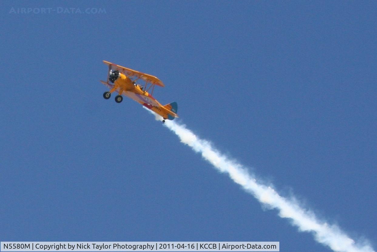N5580M, 1943 Boeing B75N1 C/N 75-7755, Overhead break with smoke on at the Cable fly-in