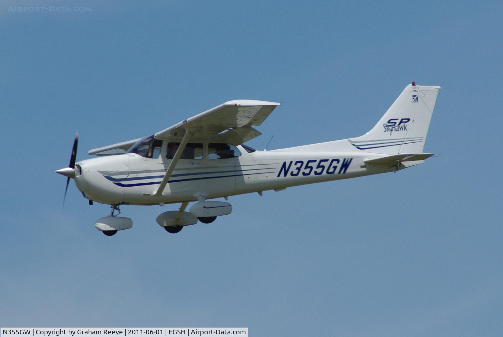 N355GW, 2003 Cessna 172S C/N 172S9355, About to touch down.