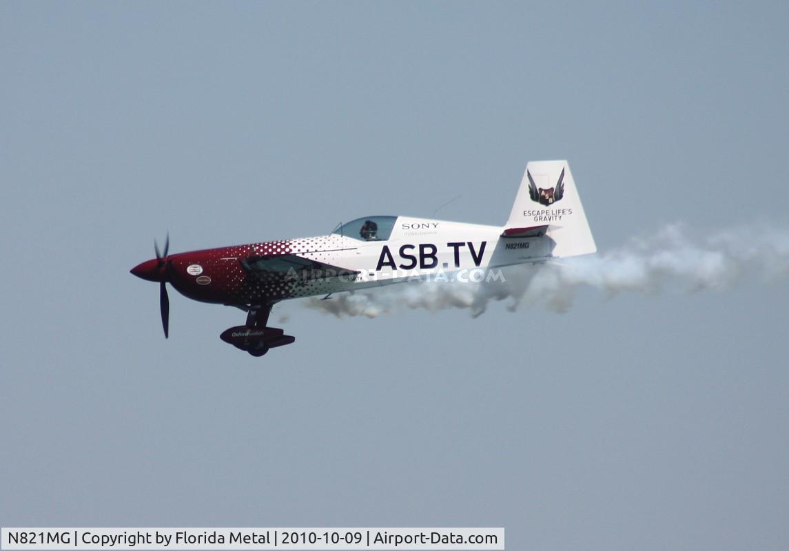 N821MG, 2006 Extra EA-300S C/N 1035, Mike Goulian over Daytona