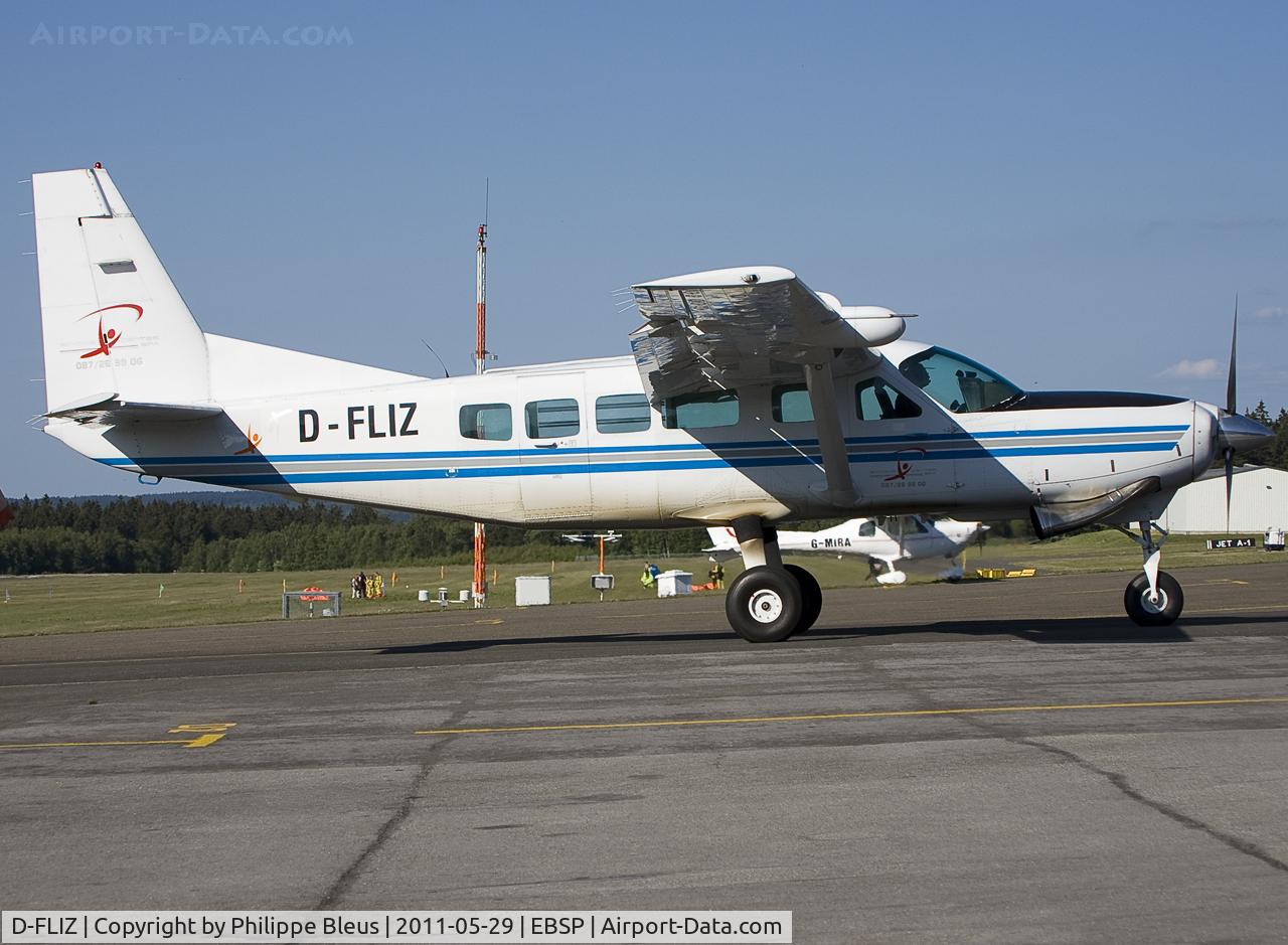 D-FLIZ, 1994 Cessna 208 Caravan I C/N 20800241, Local character, climbing up from rwy 23 after landing to get more sky divers (before dropping them above the field). Once again, the taxiway and the parking in Spa are NOT horizontal.
