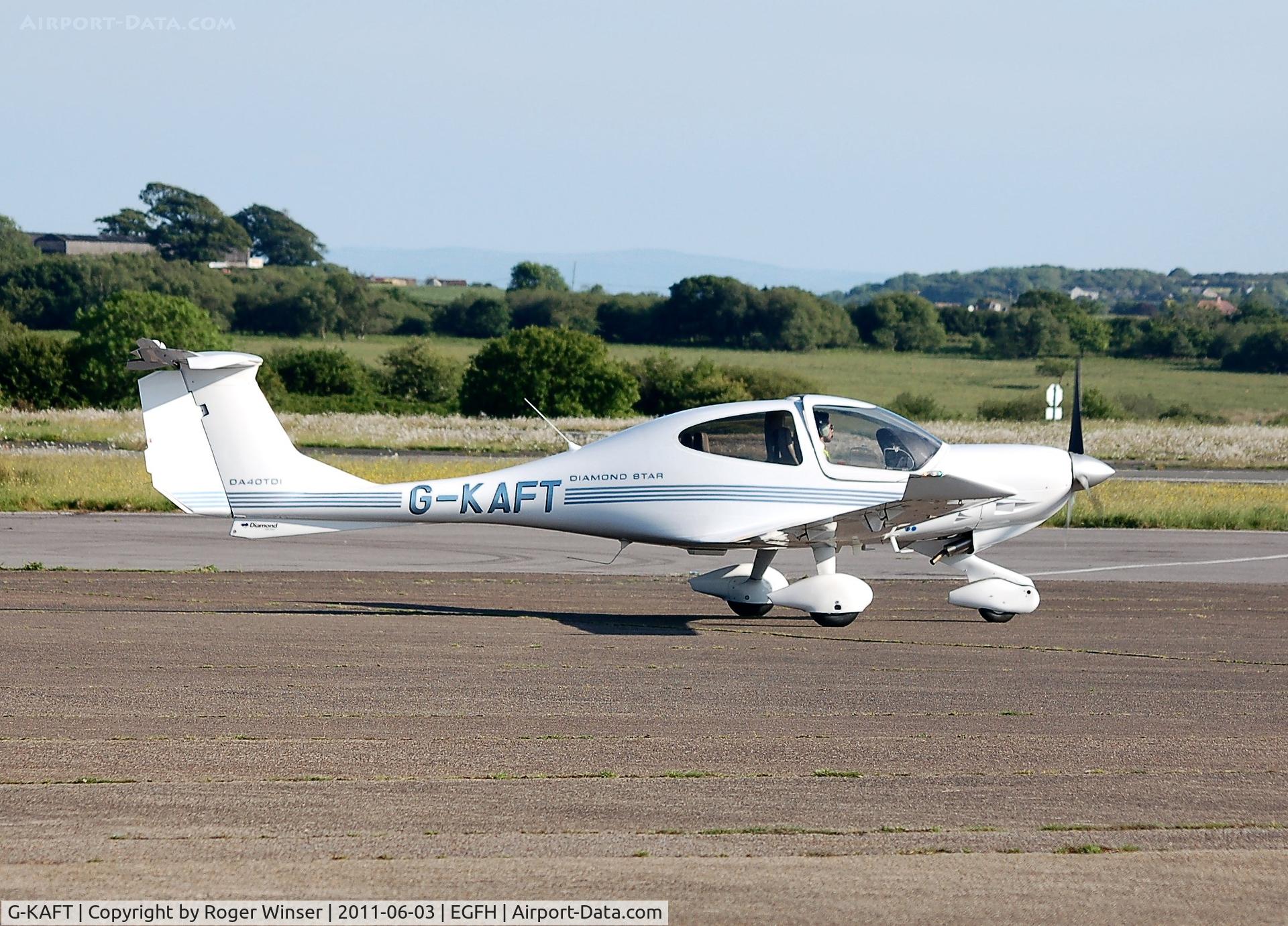 G-KAFT, 2005 Diamond DA-40D Diamond Star C/N D4.191, Atlantic Flight Training's Diamond Star taxying prior to departure.