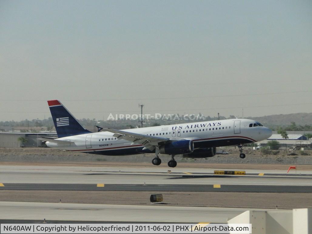 N640AW, 1994 Airbus A320-232 C/N 448, Touching down on runway 25L