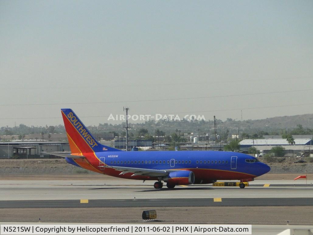N521SW, 1991 Boeing 737-5H4 C/N 25320, Taking off from runway 25R