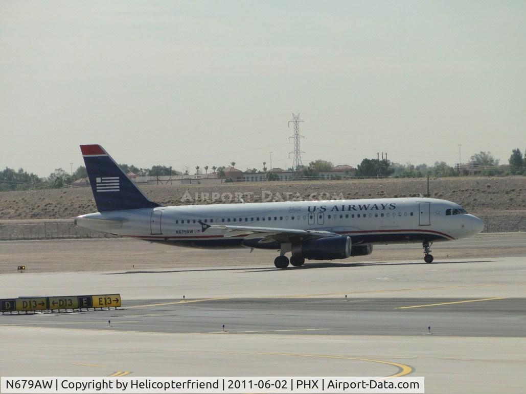 N679AW, 2005 Airbus A320-232 C/N 2613, Taxiing for take off at runway 25R