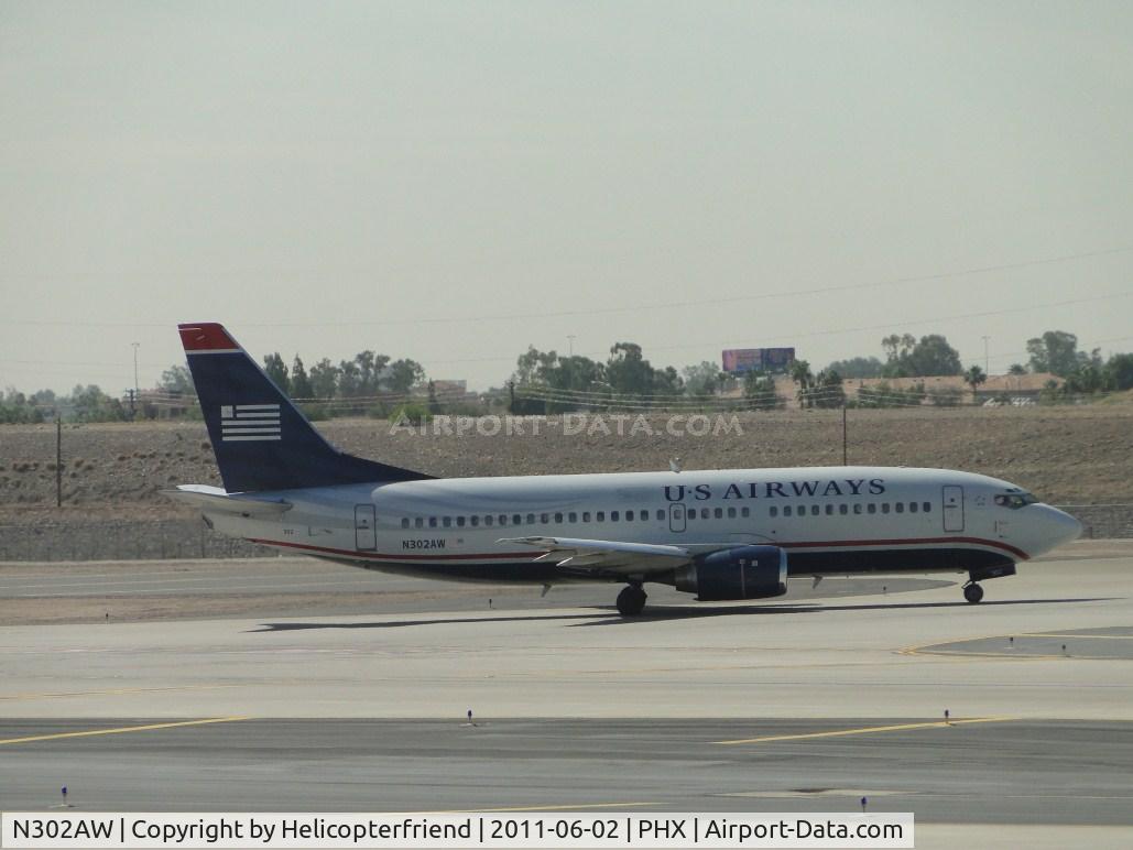 N302AW, 1988 Boeing 737-3G7 C/N 24009, Taxiing for take off at runway 25R