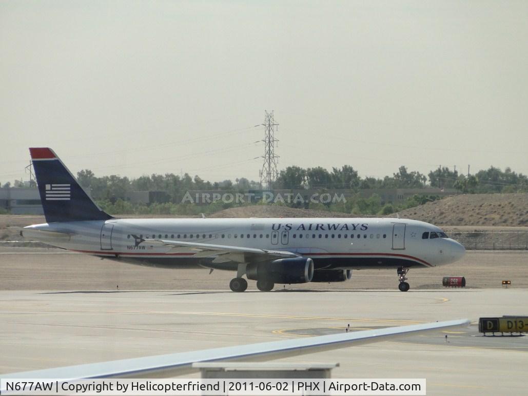 N677AW, 2005 Airbus A320-232 C/N 2430, Taxiing for take off at runway 25R