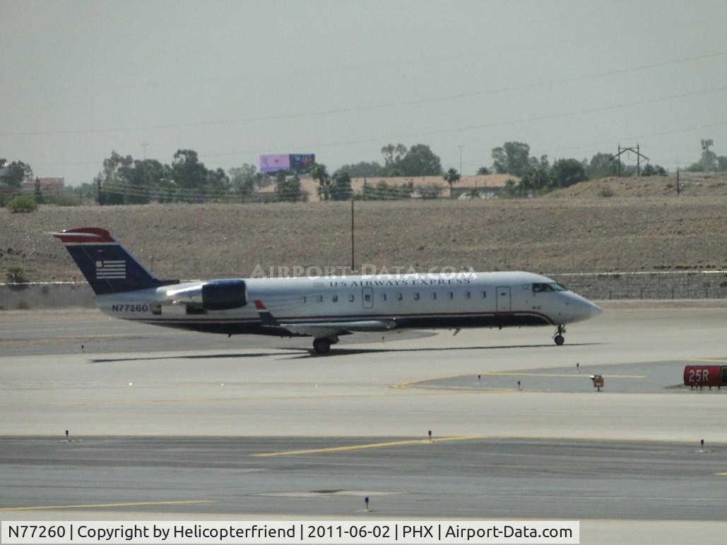 N77260, 1998 Bombardier CRJ-200LR (CL-600-2B19) C/N 7260, Taxiing for take off at runway 25R