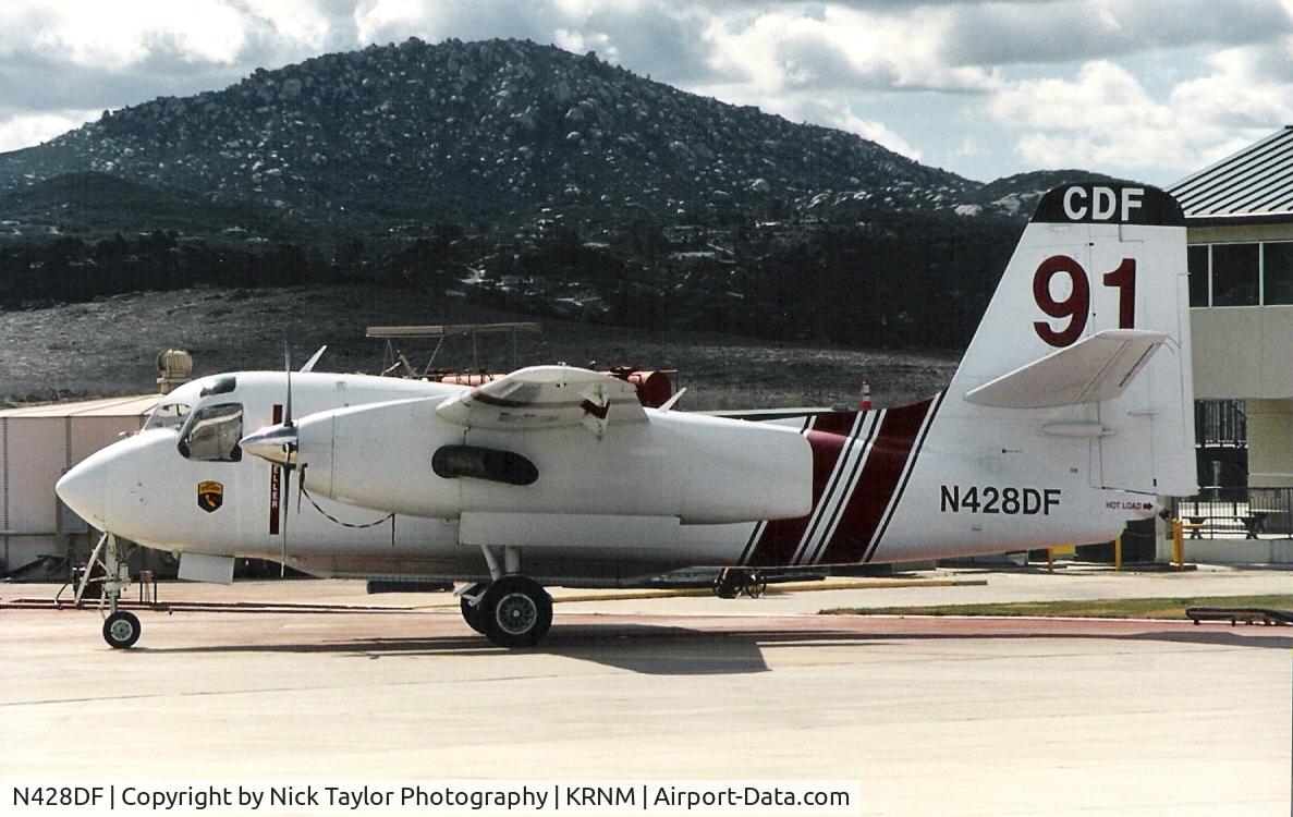 N428DF, Marsh Aviation S-2F3AT C/N 443262, Tanker 91 sits at Ramona during the off season. Scanned photo.