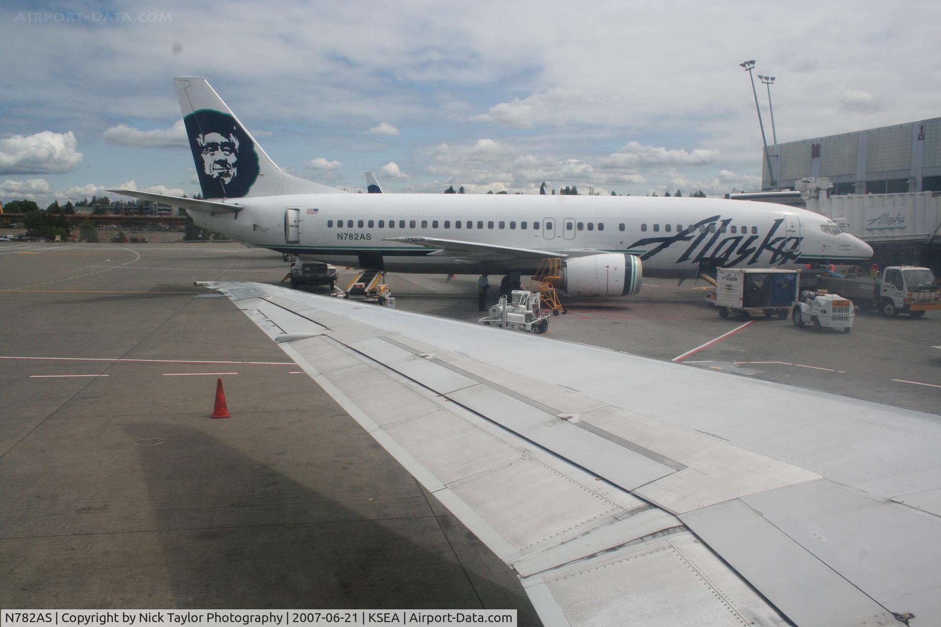 N782AS, 1994 Boeing 737-4Q8 C/N 25113, Being loaded. Shot taken from N949AS.
