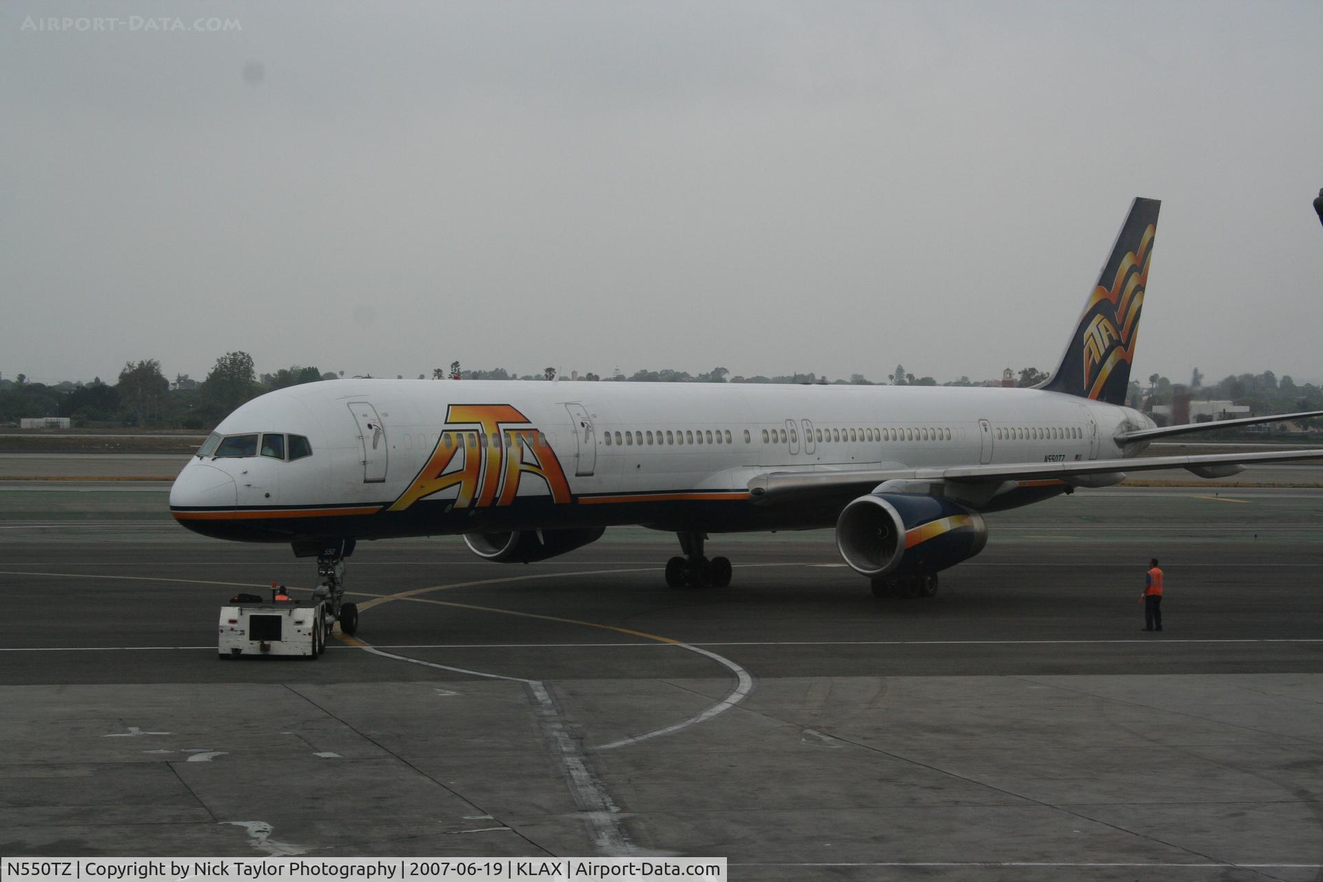 N550TZ, 2001 Boeing 757-33N C/N 32584, ATA being pushed out of gate 34 at terminal 3