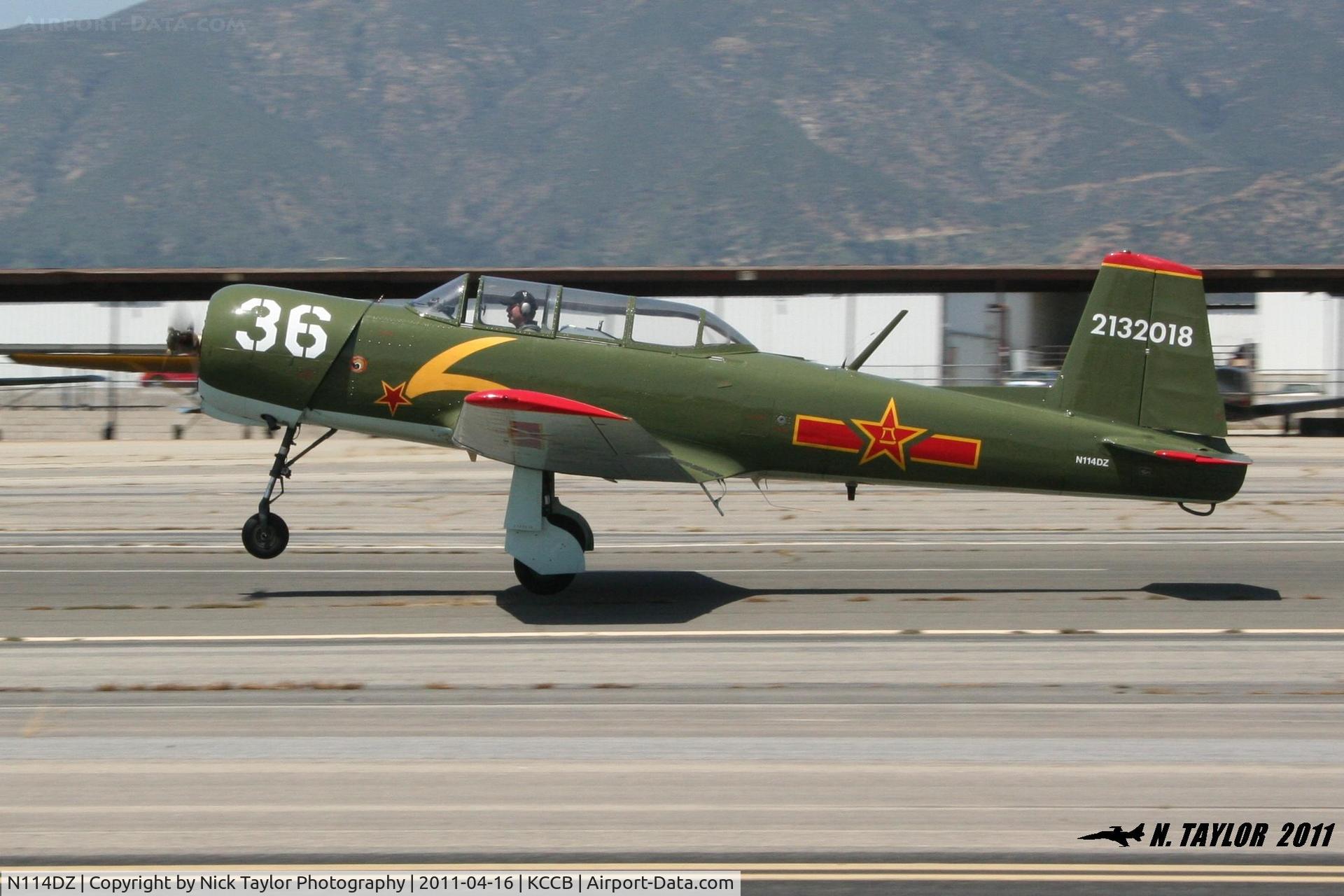 N114DZ, 1967 Nanchang CJ-6A C/N 2132018, Taking off with the red star formation group.