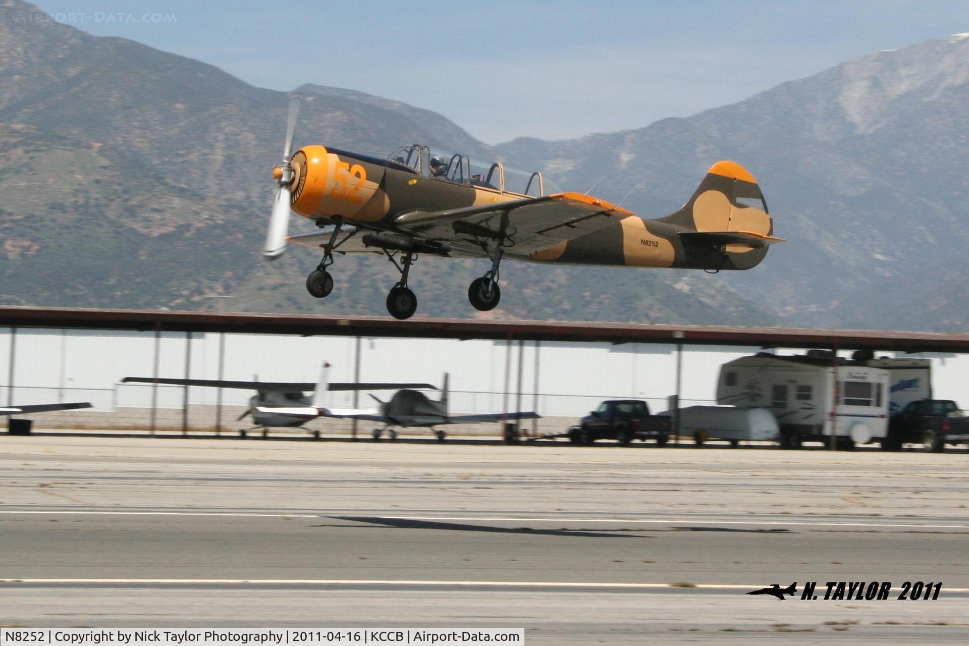 N8252, 1982 Yakovlev Yak-52 C/N 822903, Taking off with the Red Star formation group.