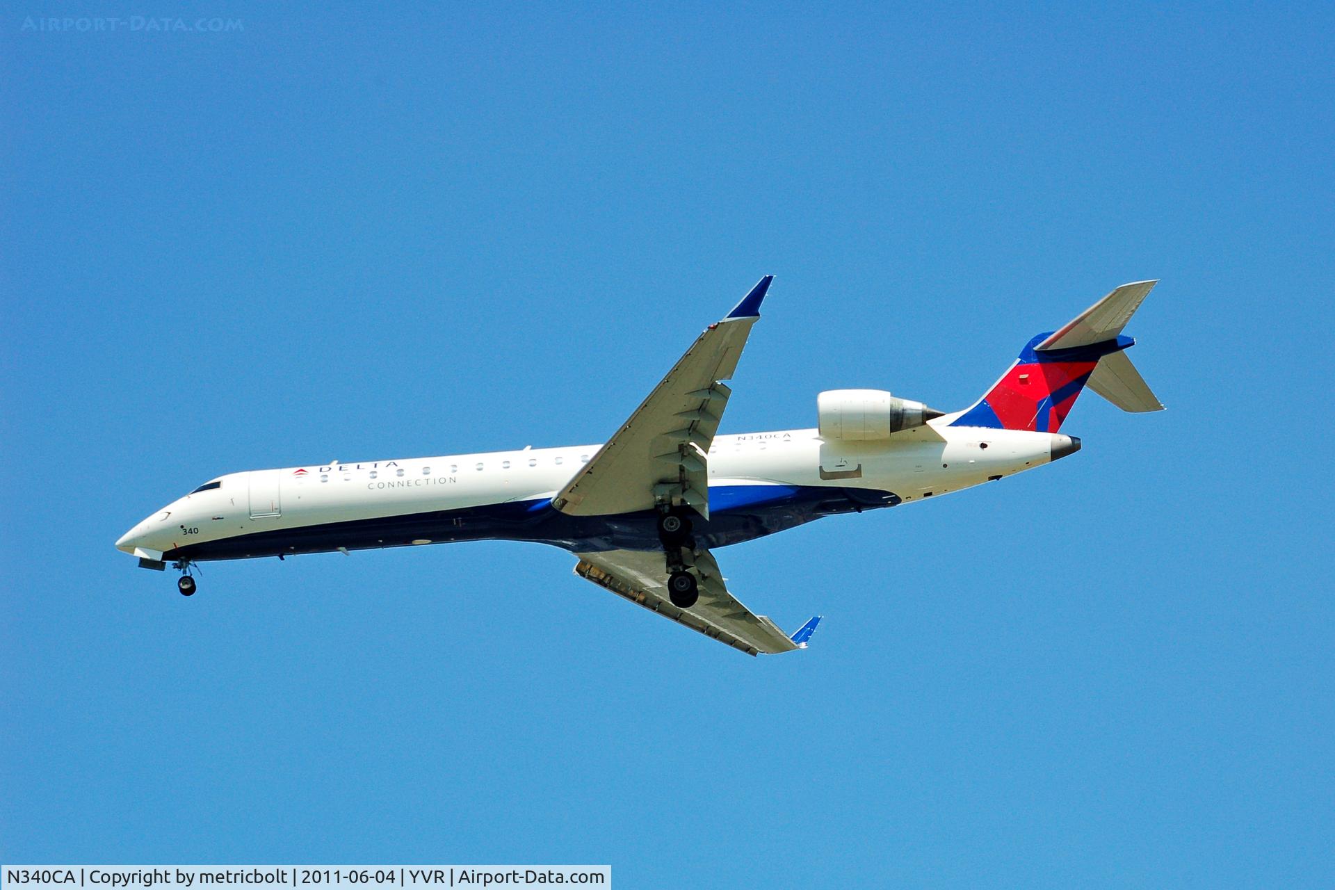 N340CA, 2002 Bombardier CRJ-701ER (CL-600-2C10) Regional Jet C/N 10062, Landing at YVR
