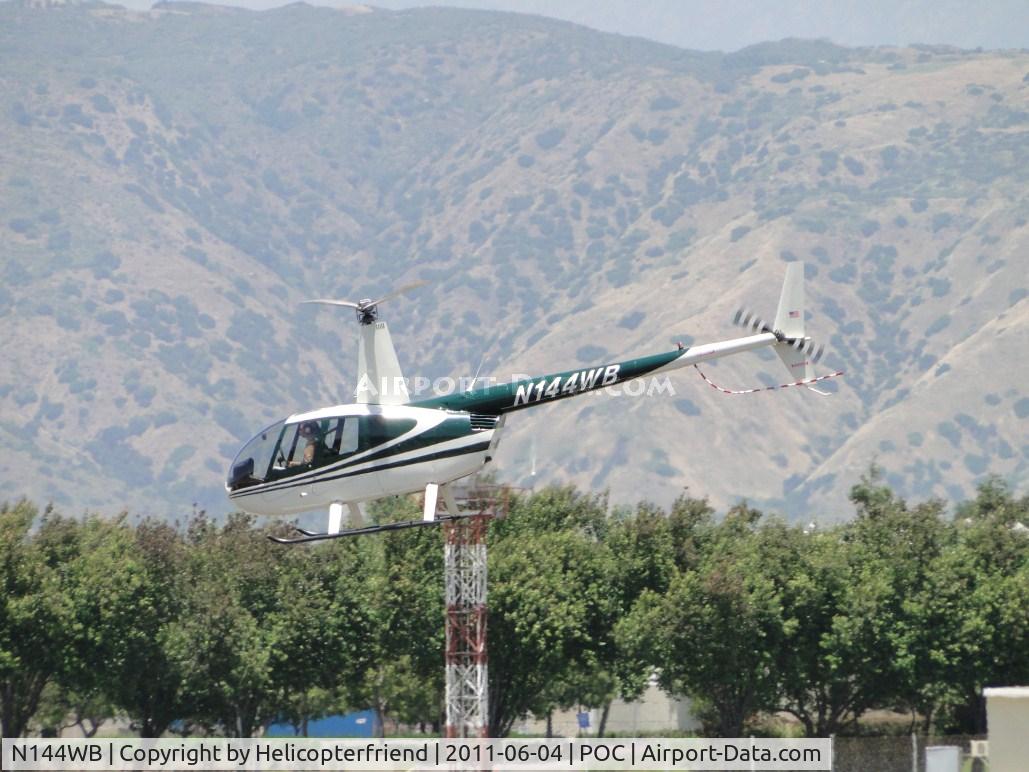N144WB, 1998 Robinson R44 C/N 0545, Finished hovering into runway 26L and nose is down and the Robinson departs westbound