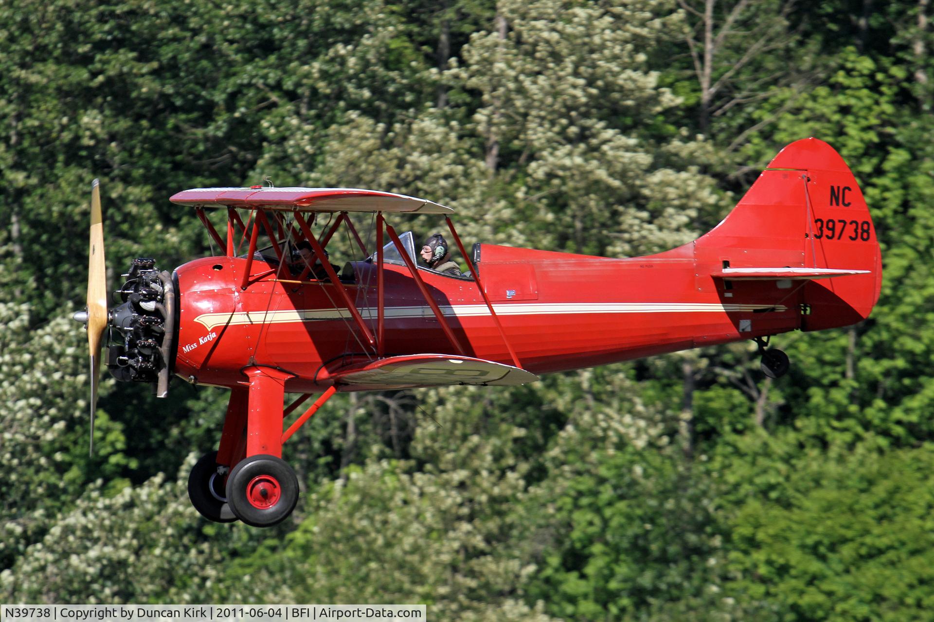 N39738, 1942 Waco UPF-7 C/N 5871, Gorgeous back drop to this landing shot at BFI