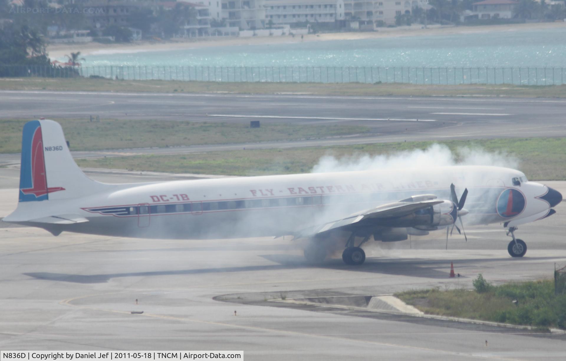 N836D, 1957 Douglas DC-7B C/N 45345, N836D starting at TNCM radio man warn tower to beware of smoke!!!!! ROGER