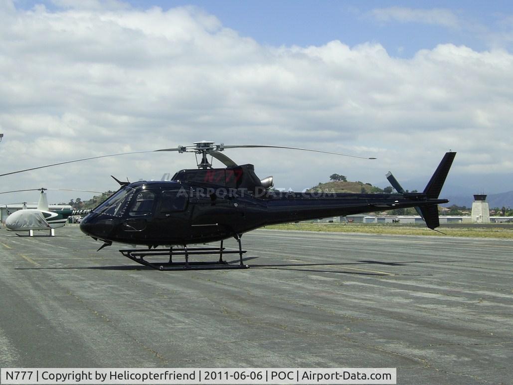 N777, 2003 Eurocopter AS-350B-2 Ecureuil Ecureuil C/N 3709, Shinny black helicopter in transient parking