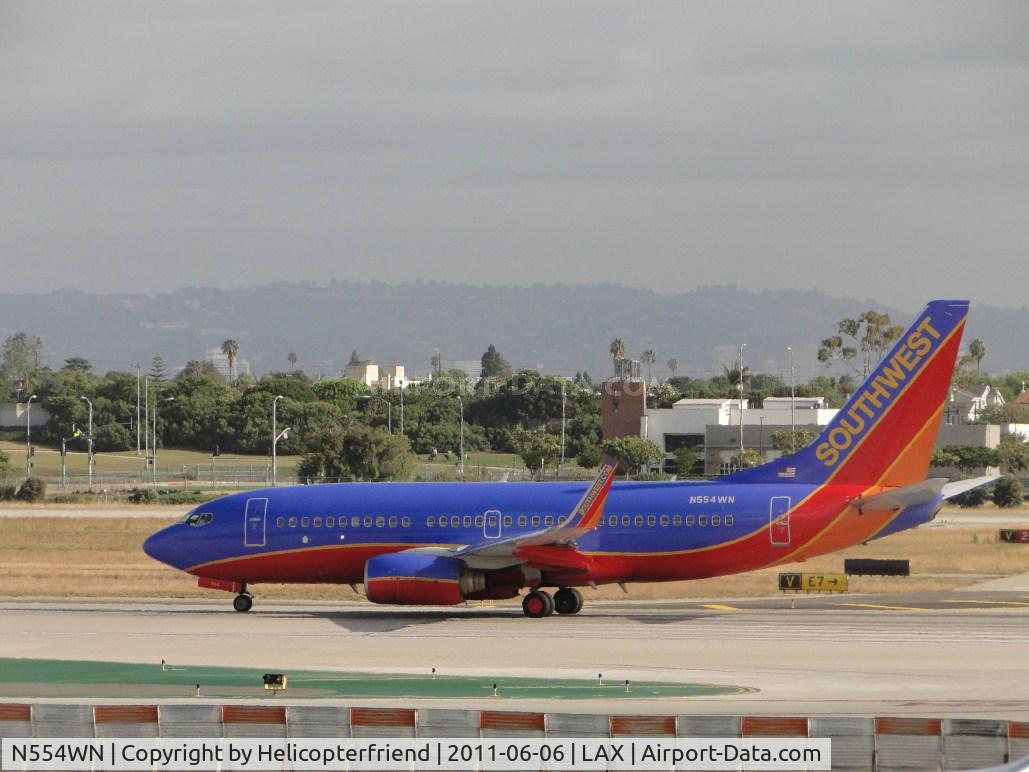 N554WN, 2002 Boeing 737-7BX C/N 30746, Waiting to move to runway 24L for take off
