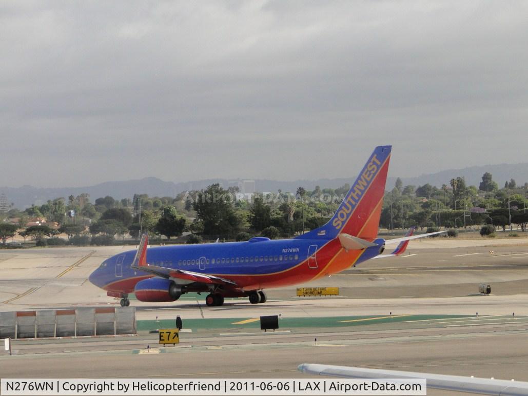 N276WN, 2007 Boeing 737-7H4 C/N 32530, Taxiing to runway 24L