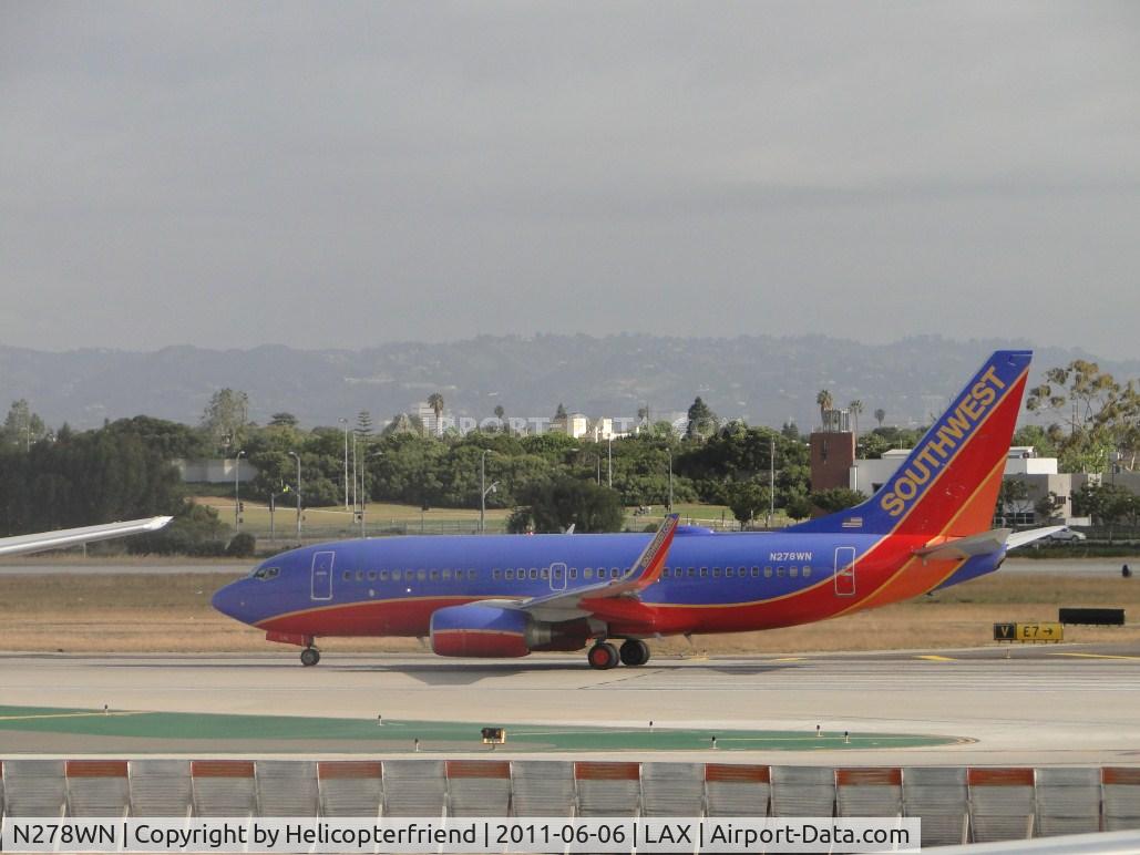 N278WN, 2007 Boeing 737-7H4 C/N 36441, Waiting it's turn to roll up to runway 24L for take off