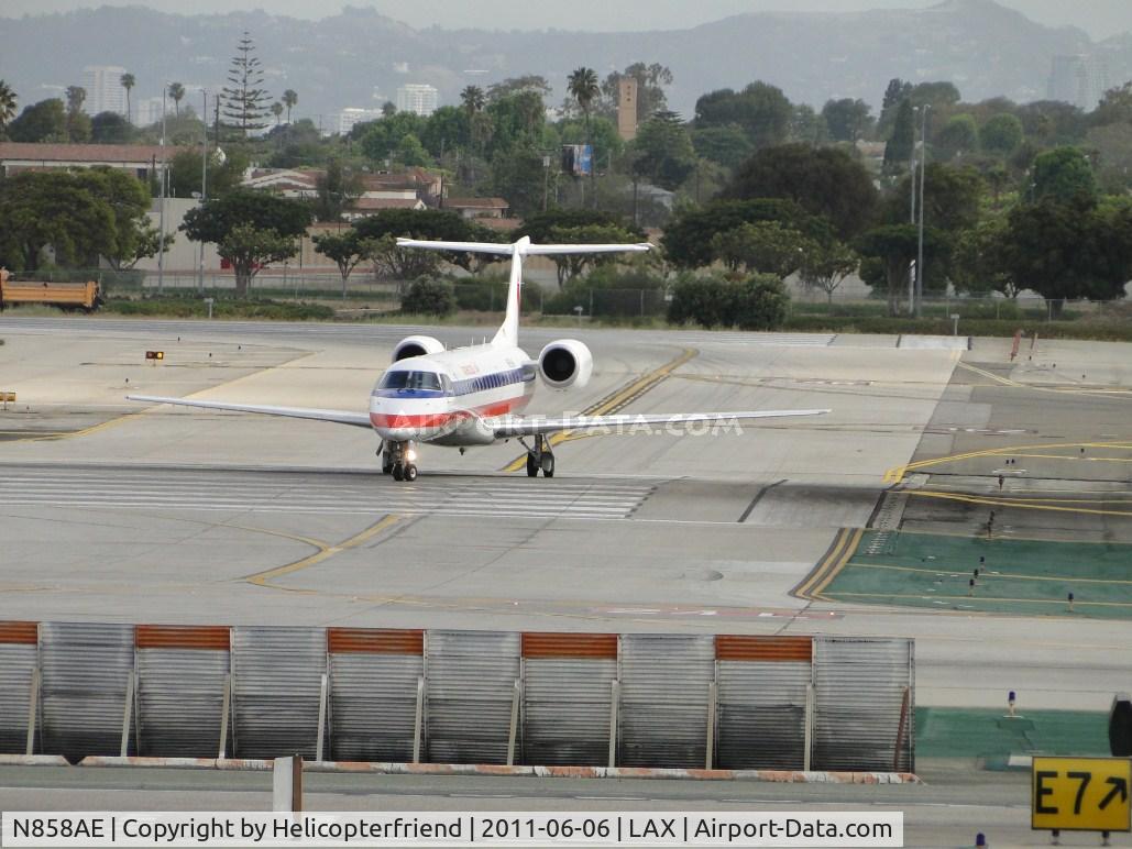 N858AE, 2003 Embraer ERJ-140LR (EMB-135KL) C/N 145754, Taxiing southbound to enter runway 24L