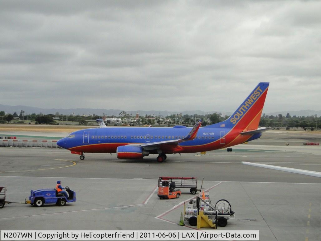 N207WN, 2005 Boeing 737-7H4 C/N 34012, Waiting her turn to enter runway 24L for take off