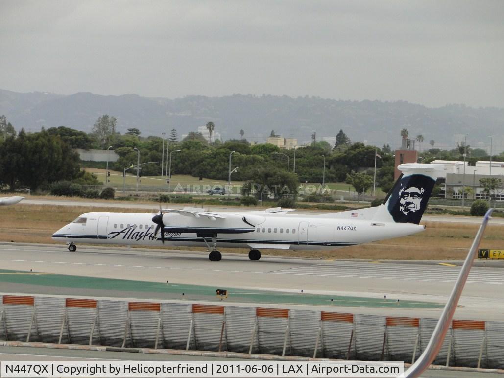 N447QX, 2011 Bombardier DHC-8-402 Dash 8 C/N 4364, Waiting to start take off roll on runway 24L