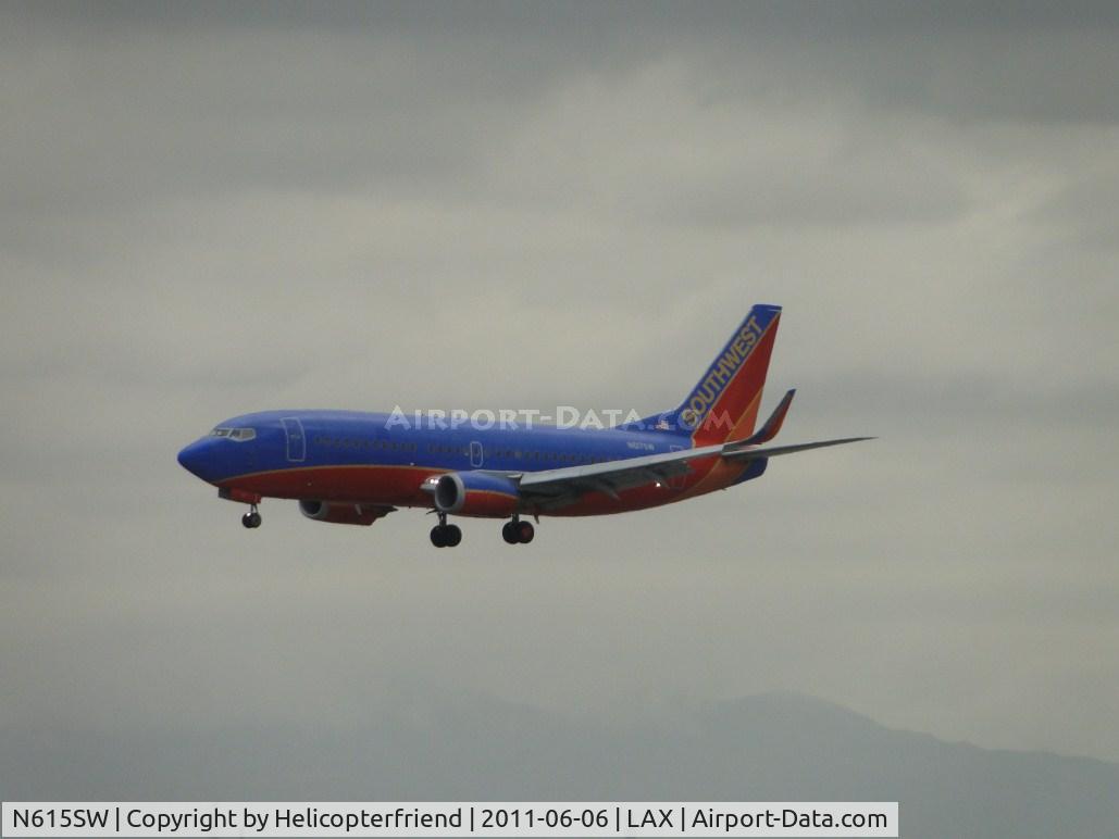 N615SW, 1995 Boeing 737-3H4 C/N 27698, Arriving from MCI, Kansas and landing on runway 24R