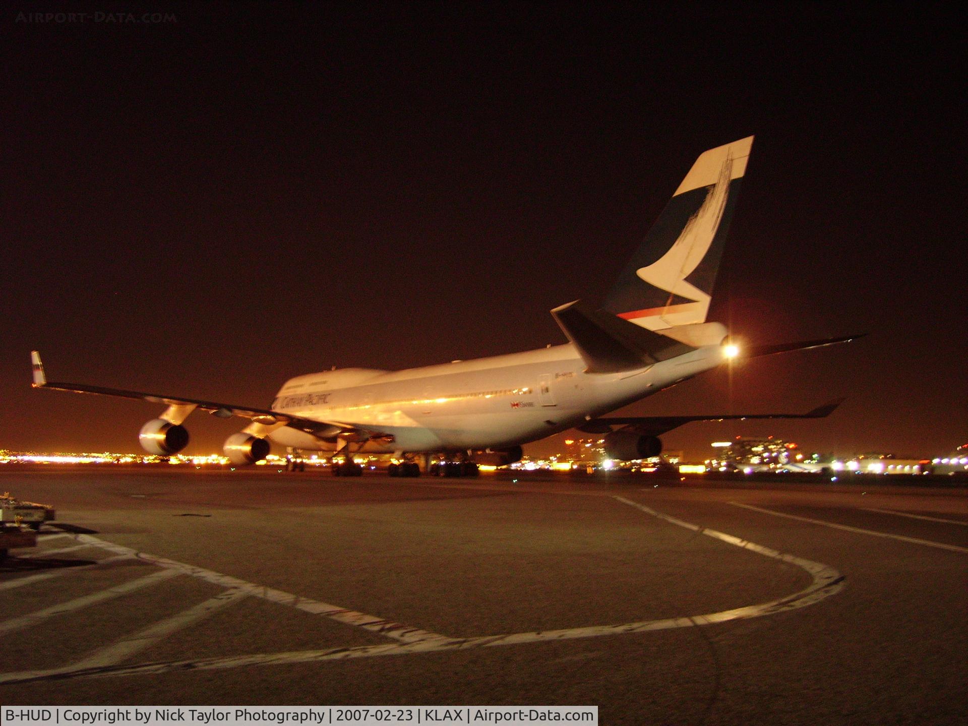B-HUD, 1992 Boeing 747-467 C/N 25874, Being pushed back from TBIT as I wait in a tug loaded with mail.