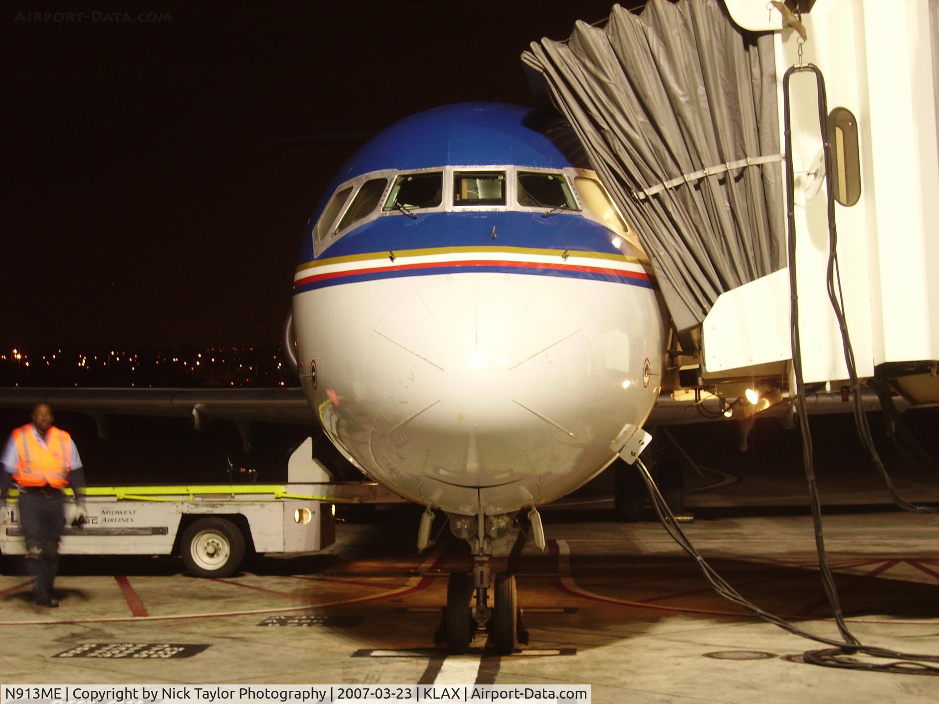 N913ME, 2003 Boeing 717-2BL C/N 55176, Midwest Flight 87 MKE-LAX is being offloaded at Terminal 3