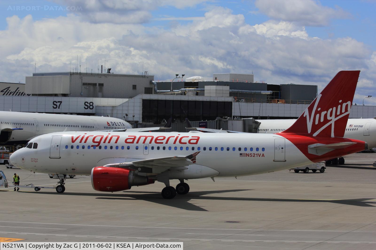 N521VA, 2006 Airbus A319-112 C/N 2773, Being pushed out of the gate.