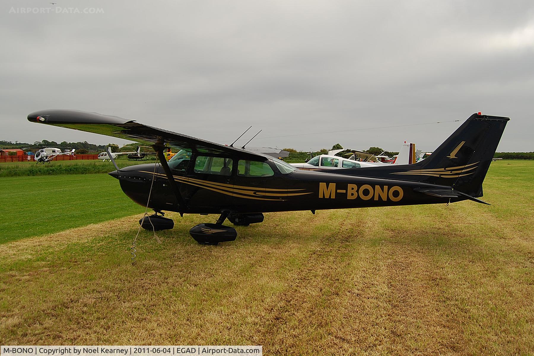 M-BONO, 1977 Cessna 172N Skyhawk II C/N 172-70299, Parked on the display area at the Newtownards Fly-in 04-06-2011.