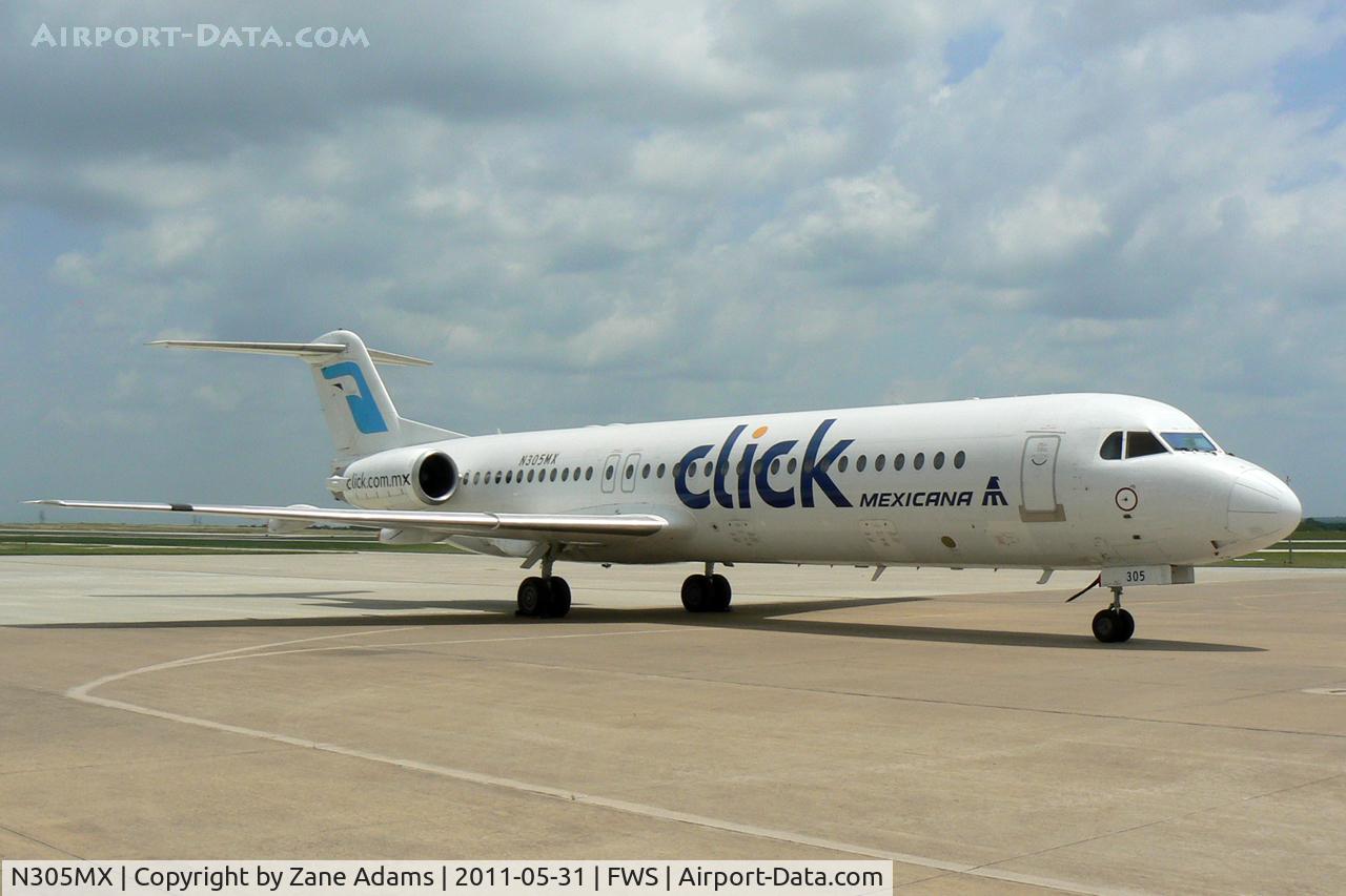 N305MX, 1991 Fokker 100 (F-28-0100) C/N 11305, An interesting visitor at Fort Worth Pinks Airport.