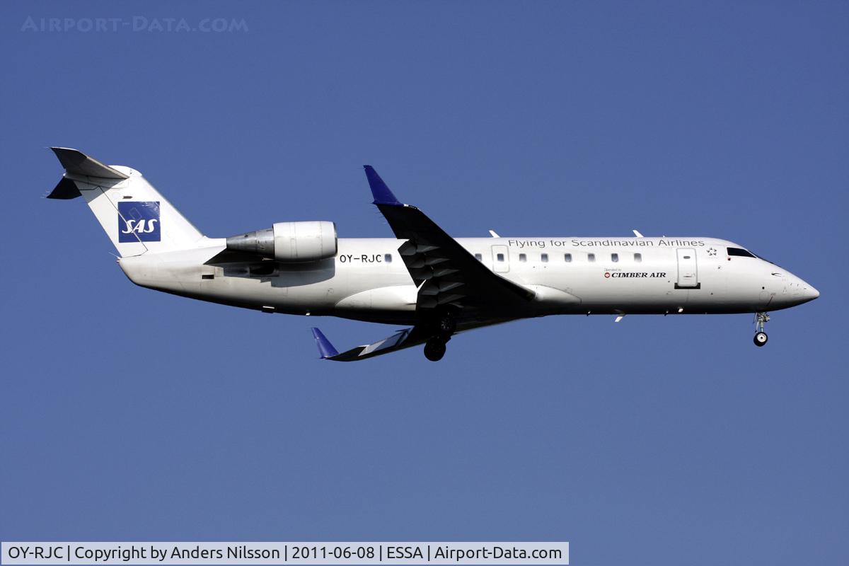 OY-RJC, 1993 Canadair CRJ-100LR (CL-600-2B19) C/N 7015, On final approach for runway 19L.