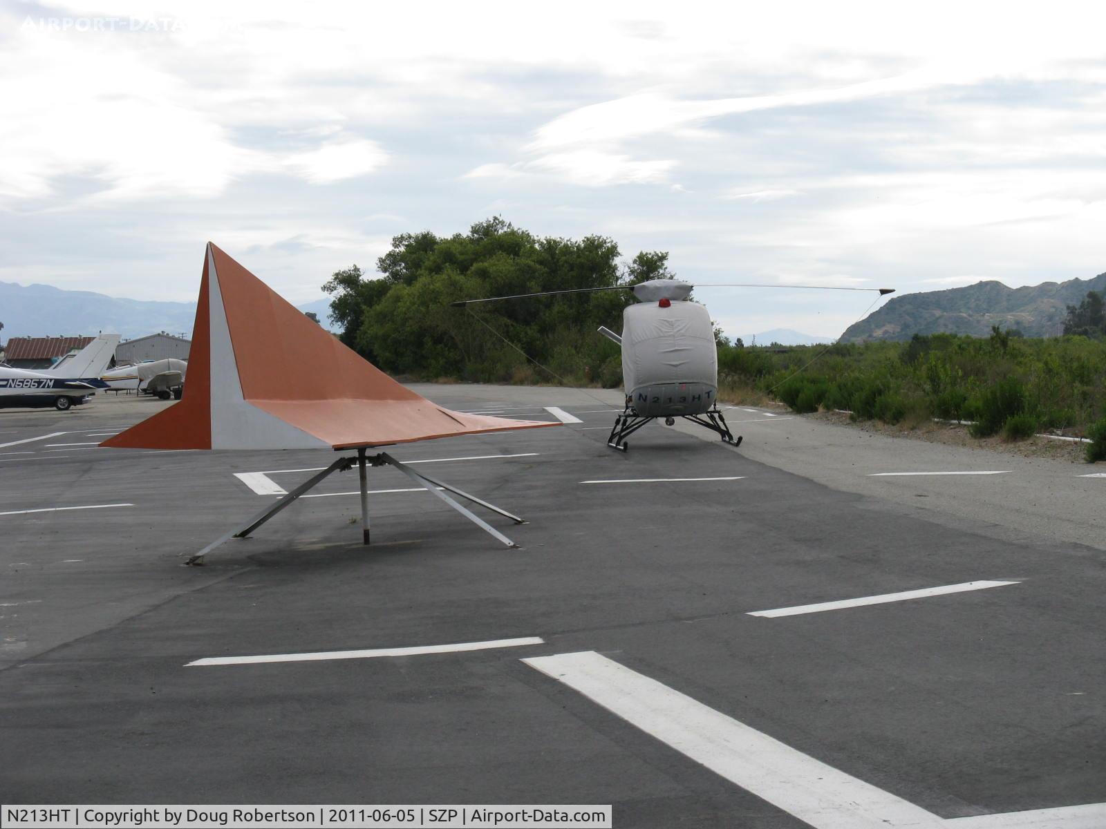 N213HT, 1968 Hughes TH-55 C/N 67-16822(780929), 1968 Hughes 269A ex U S Army TH-55A OSAGE, one Lycoming HIO-360 180 Hp, landed near SZP's Helipad.