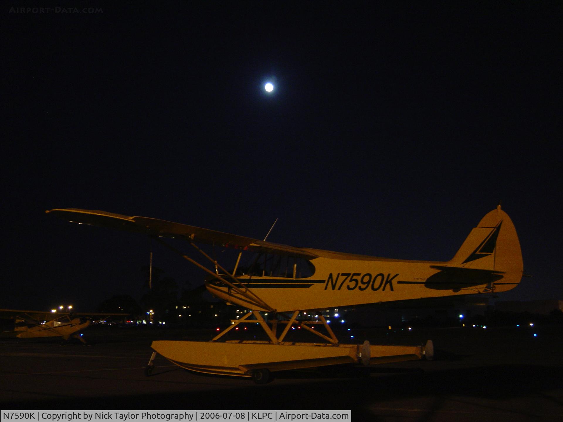 N7590K, 1950 Piper PA-18 C/N 18-307, Parked during the Piper Cub Fly-in under a full moon.