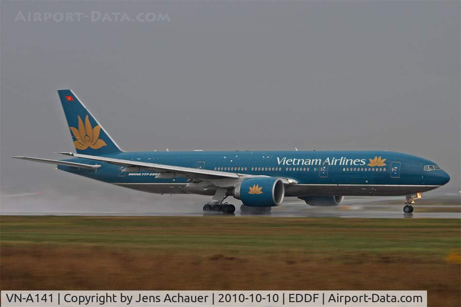 VN-A141, 2003 Boeing 777-2Q8/ER C/N 28688, Rainy take-off on rwy 18
