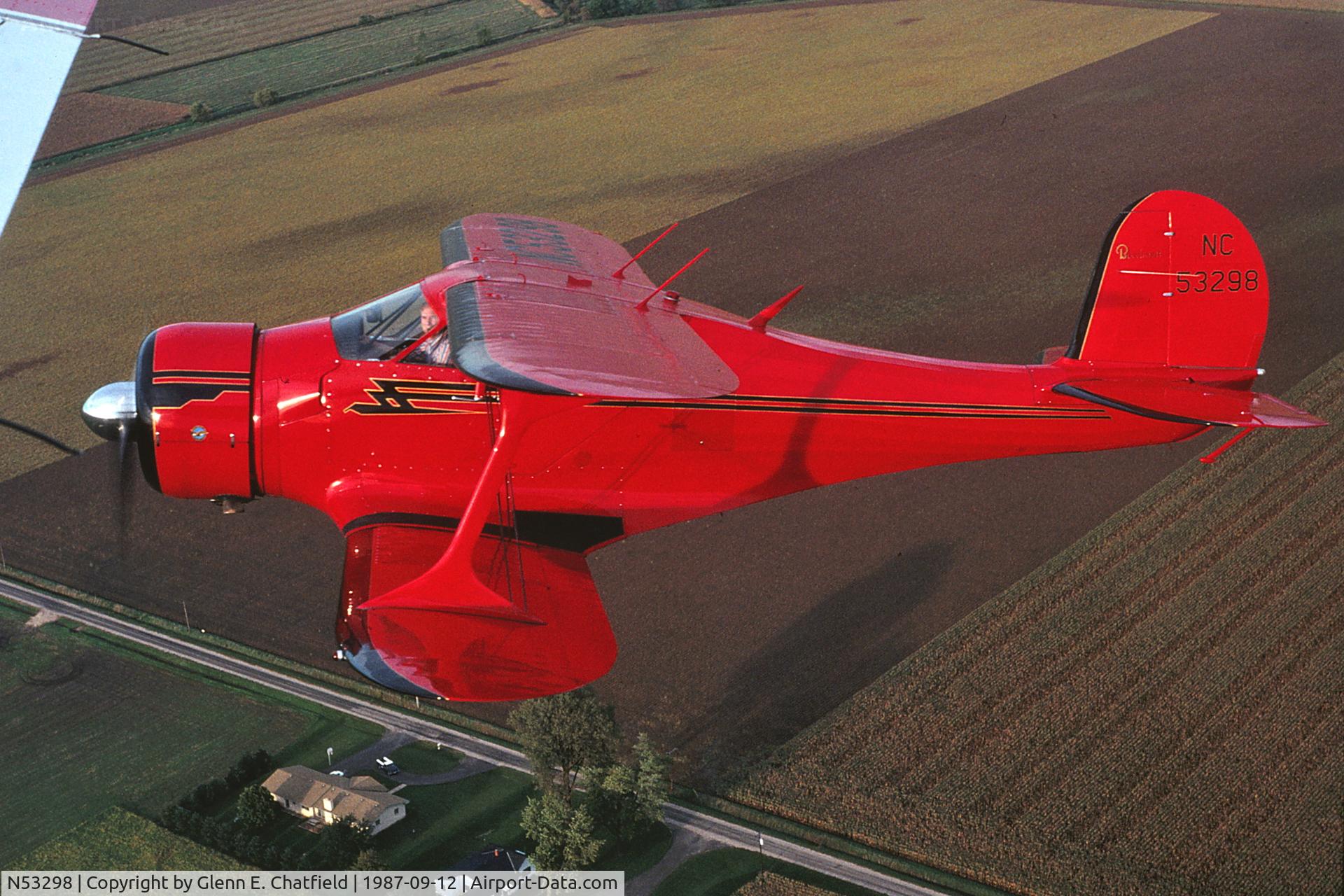 N53298, 1943 Beech D17S Staggerwing C/N 4900, UC-43 43-10852.  Photographed from N404T somewhere near Casa De Aero Airport NW of Chicago