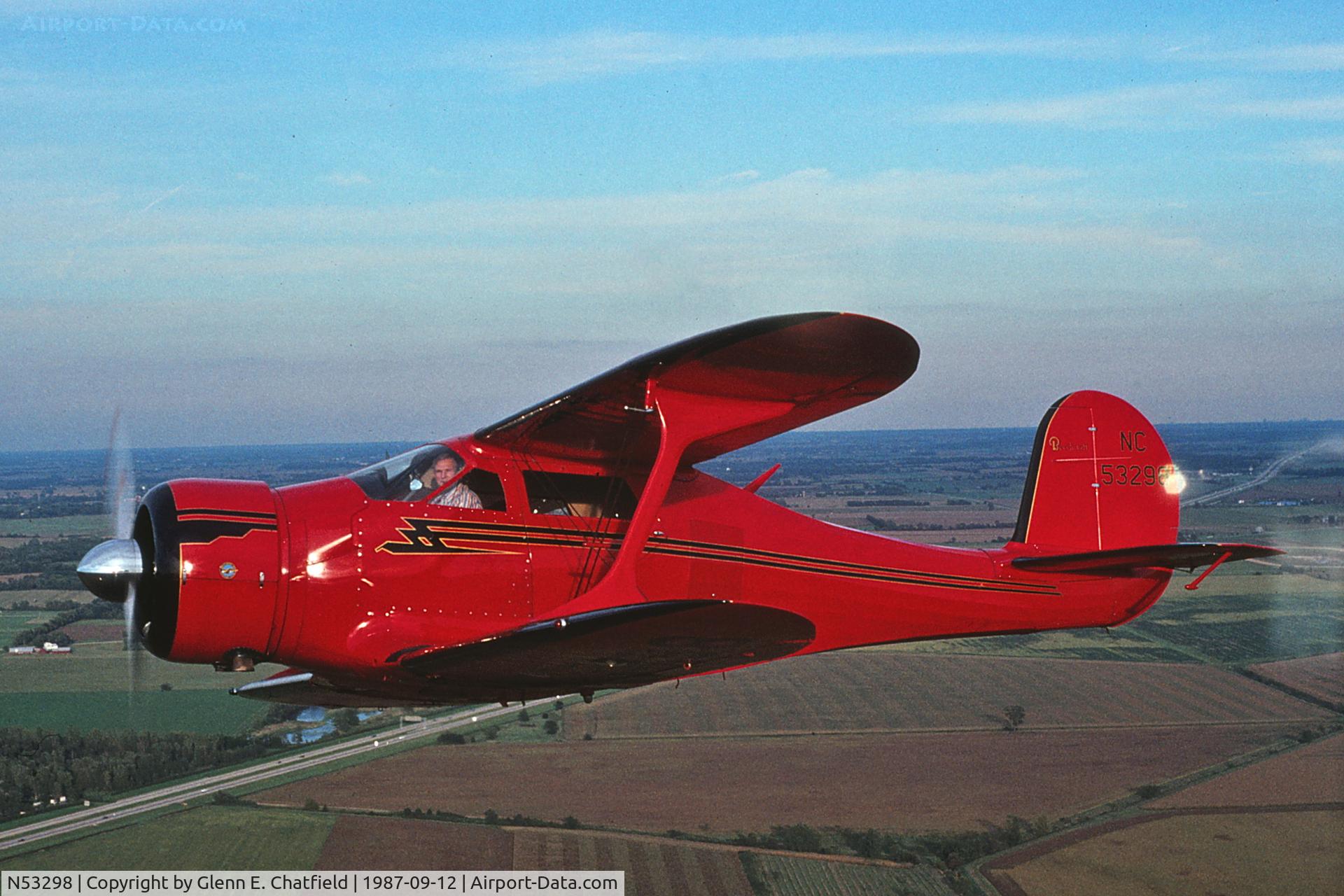 N53298, 1943 Beech D17S Staggerwing C/N 4900, UC-43 43-10852. Photographed from N404T somewhere near Casa De Aero Airport NW of Chicago