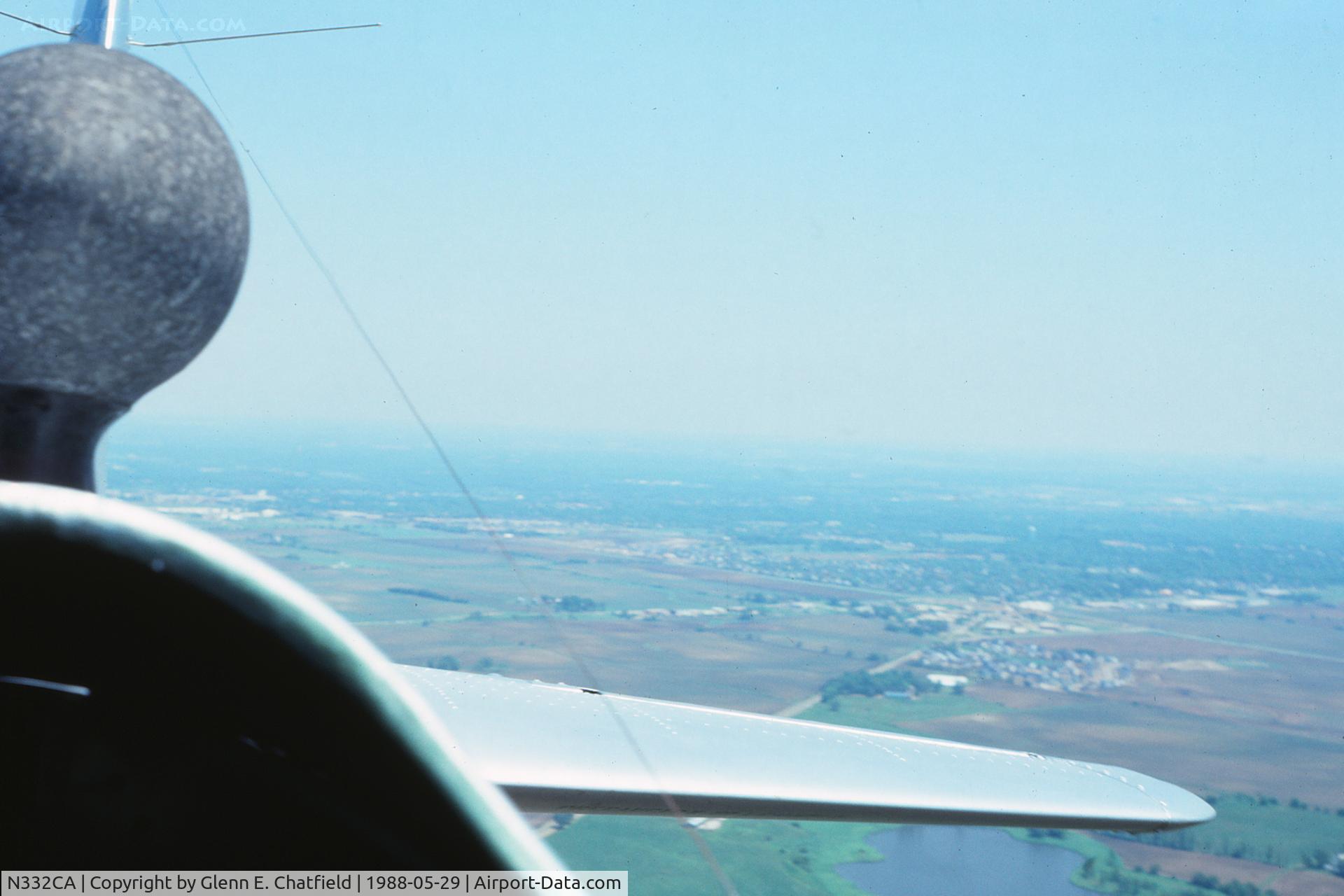 N332CA, 1944 North American T-6G Texan C/N 168-409, Looking out left rear, from rear cockpit, flying over the Geneva, IL area
