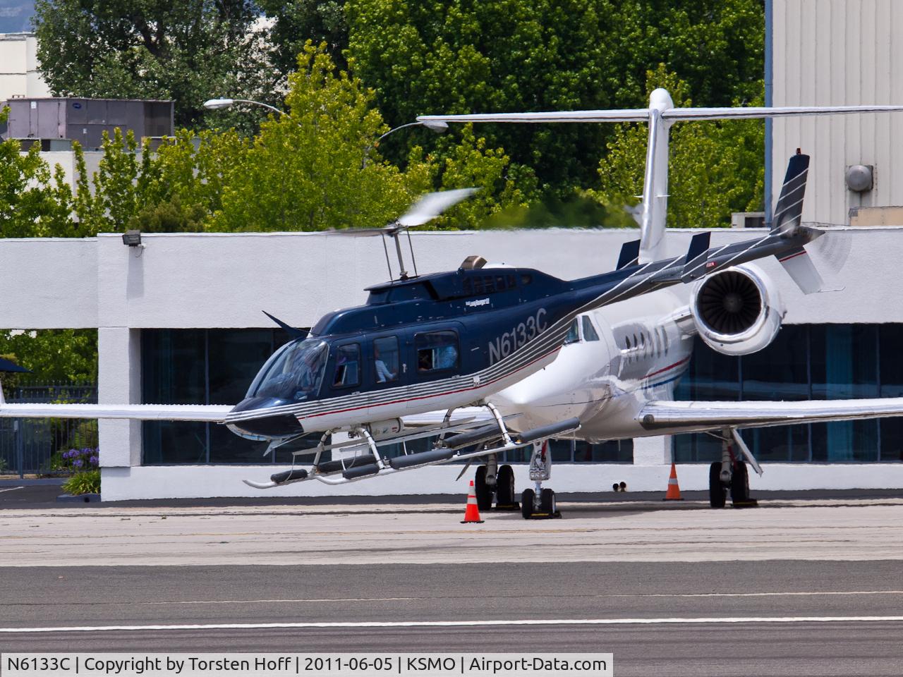 N6133C, 1991 Bell 206L-3 LongRanger III C/N 51544, N6133C departing from RWY 21