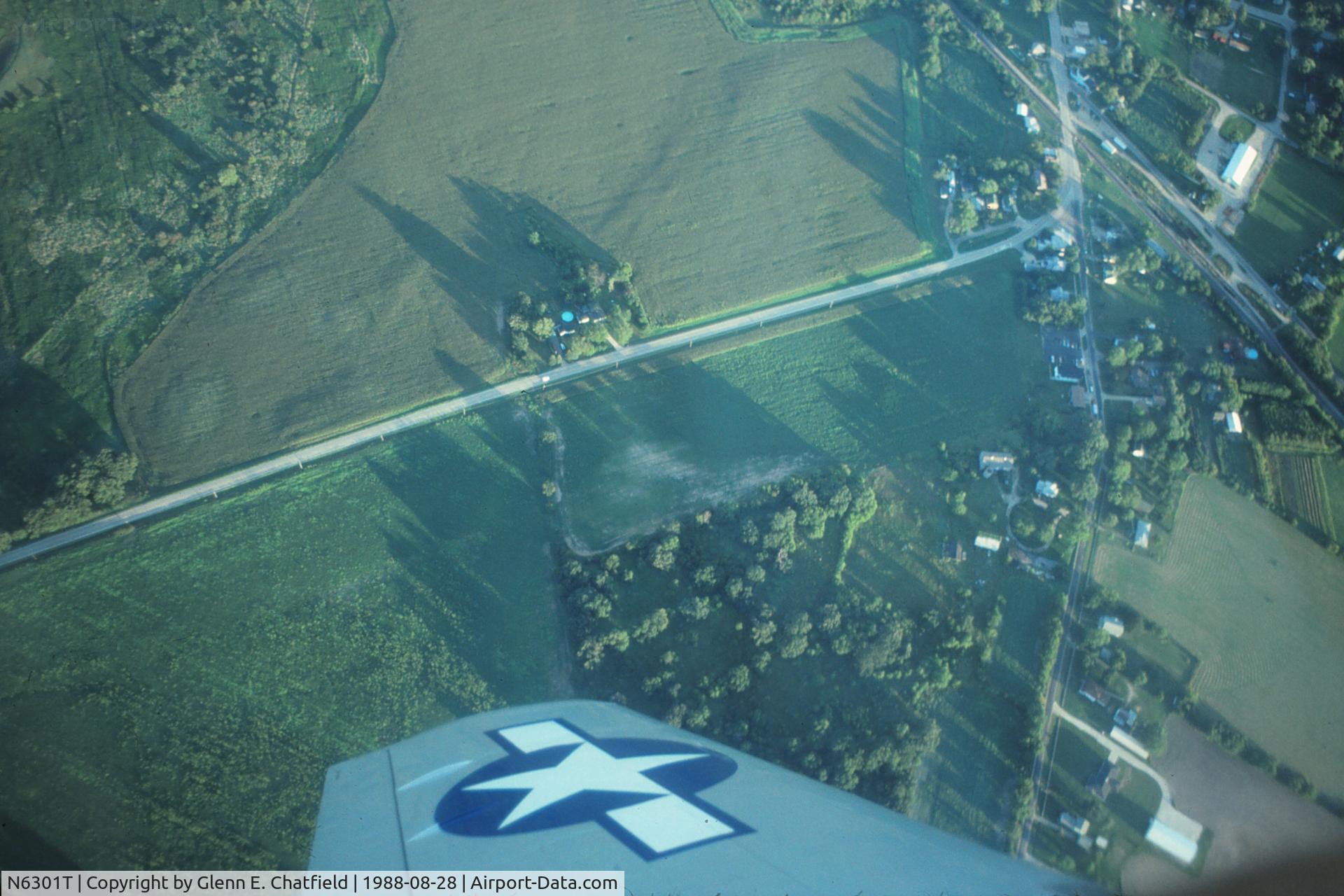 N6301T, 1962 North American P-51D Mustang C/N 44-74813, Doing a wingover northwest of DPA, as seen from the back seat.