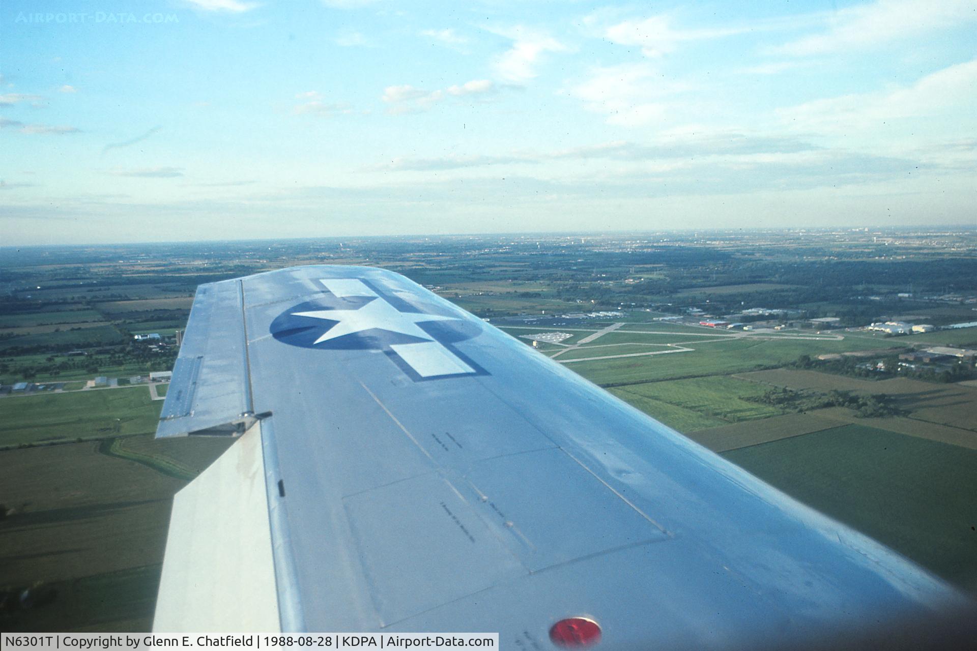 N6301T, 1962 North American P-51D Mustang C/N 44-74813, On left downwind for runway 28.
