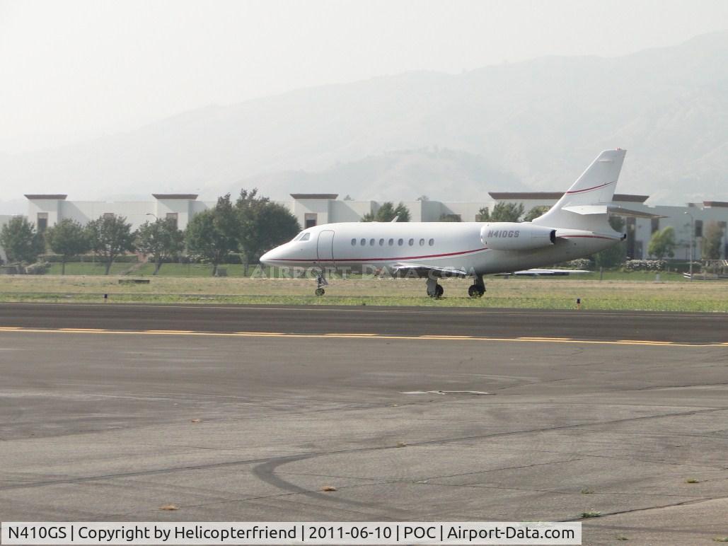 N410GS, 2000 Dassault Falcon 2000 C/N 112, Rolling westbound runway 26L for take off