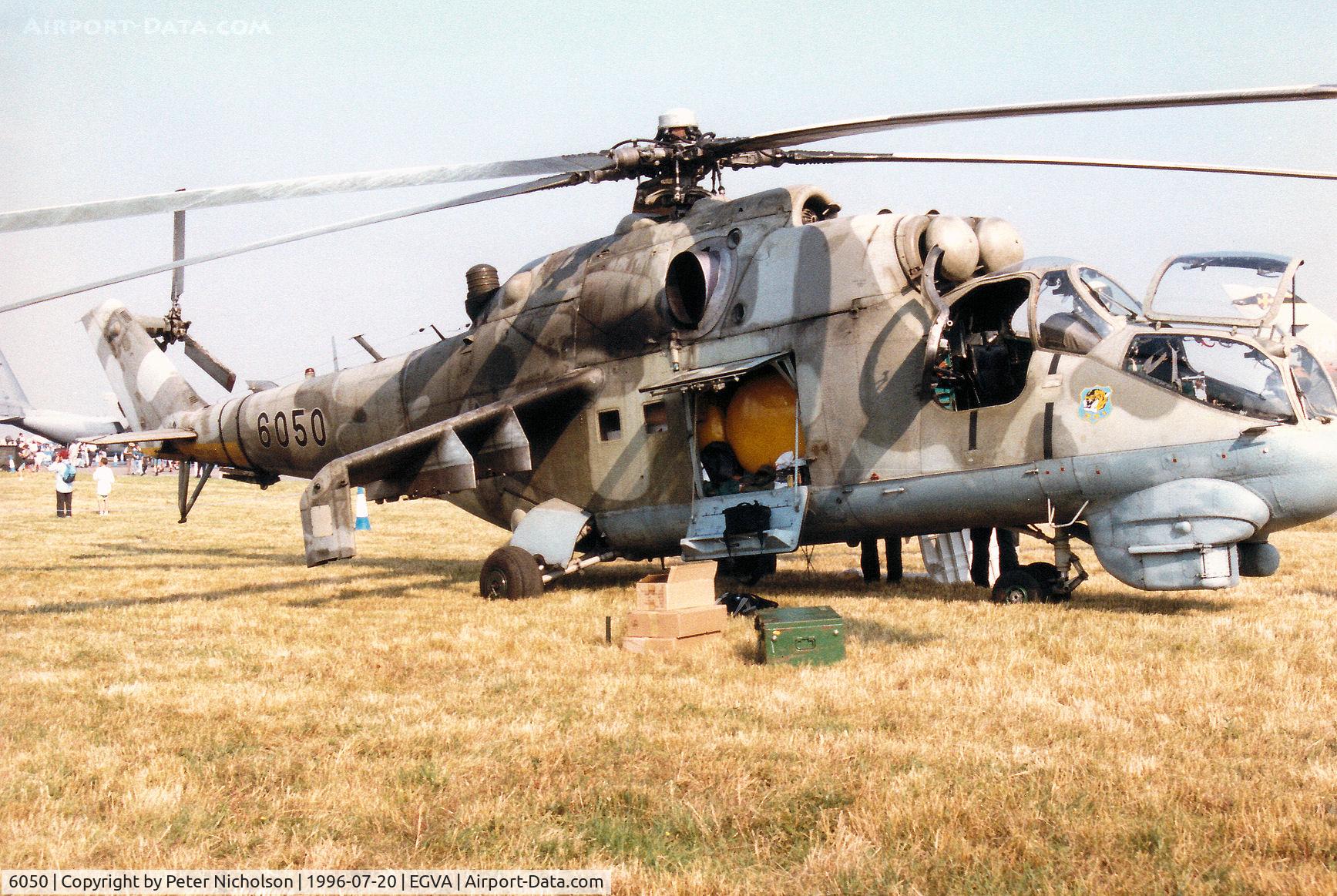 6050, Mil Mi-24DU Hind C/N 7306050, Mi-24DU Hind [dual-control training version of the Hind gunship helicopter] of 331 Squadron Czech Air Force on display at the 1996 Royal Intnl Air Tattoo at RAF Fairford.