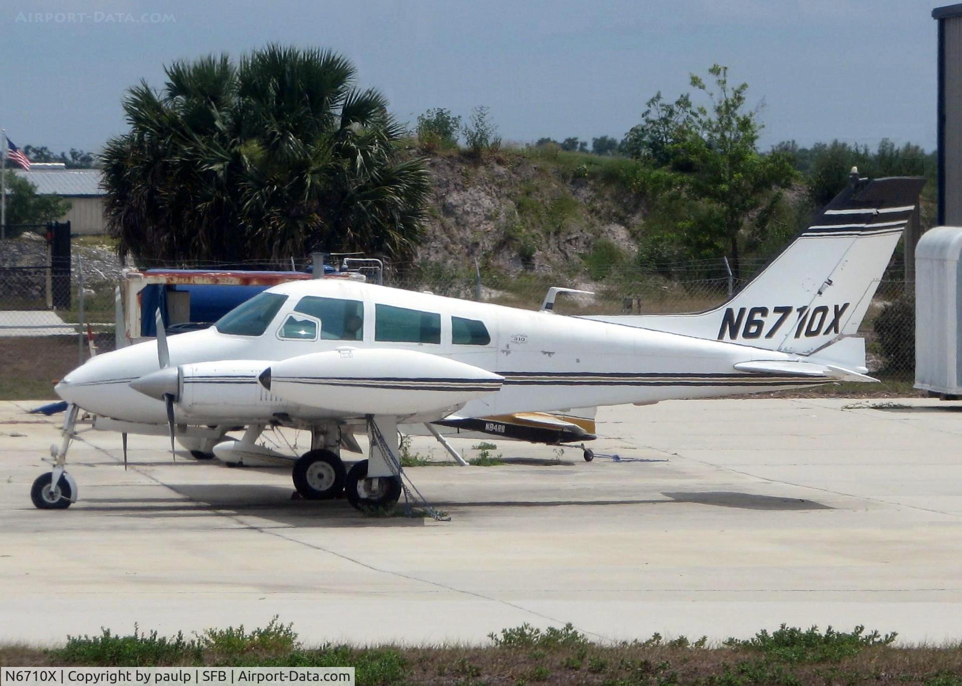 N6710X, 1960 Cessna 310F C/N 310-0010, At Sanford.